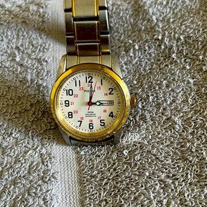 Woman’s gold tone watch